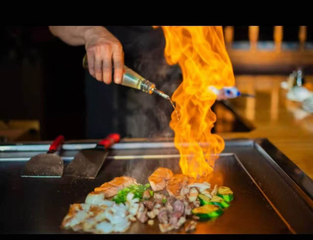 Private hibachi chef cooking teppanyaki